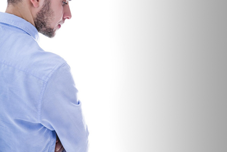 The shoulder of a mens shirt